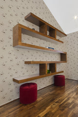 Wallpaper with a light beige background adorned with small hunting dog patterns spread evenly across the wall, enhancing the room with a classic charm and traditional wallpaper.