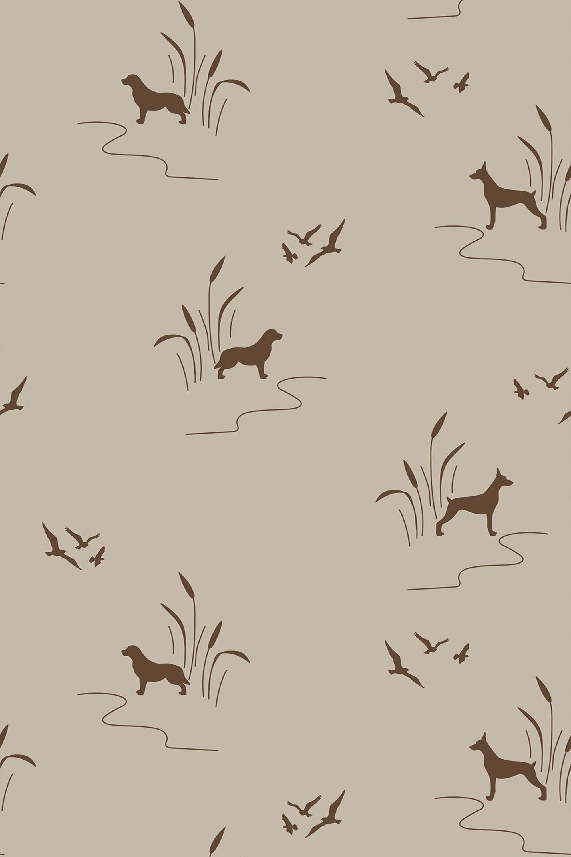 Seamless pattern with brown silhouettes of hunting dogs, birds in flight, and tall grass on a beige background. Peel and stick removable wallpaper.