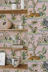 Self-adhesive wallpaper with a tropical animal theme including zebras, tigers, and lush greenery set against a soft pink background, creating a vibrant jungle atmosphere.