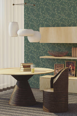 Room with wallpaper designed with a green background and a seamless pattern of small, intricate tree branches and leaves, traditional wallpaper.