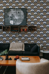 The wallpaper in the room has a Bold Heron design with graceful herons in neutral tones, featuring rich earthy colors including browns, blues, and whites. It brings an elegant and classic touch to the room, complementing the dark furniture and natural wooden elements. Traditional wallpaper.