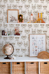 Self-adhesive wallpaper with a design of intricately drawn cats wearing glasses in a monochrome color palette, creating a whimsical yet sophisticated atmosphere for the room.