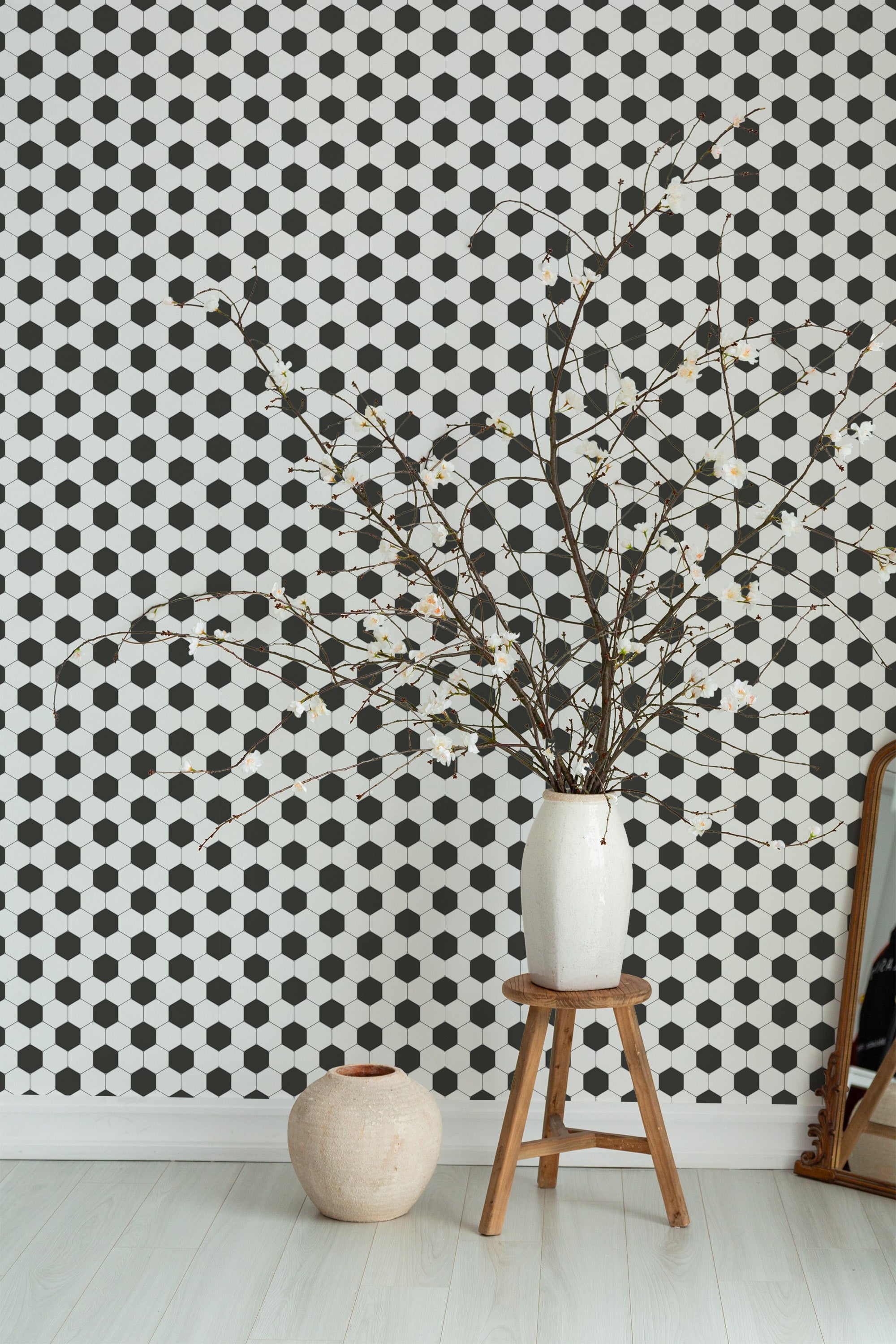 Self-adhesive wallpaper with a Football tile design, arranged in a repeating pattern of black and white hexagons creating a classic checkerboard effect.