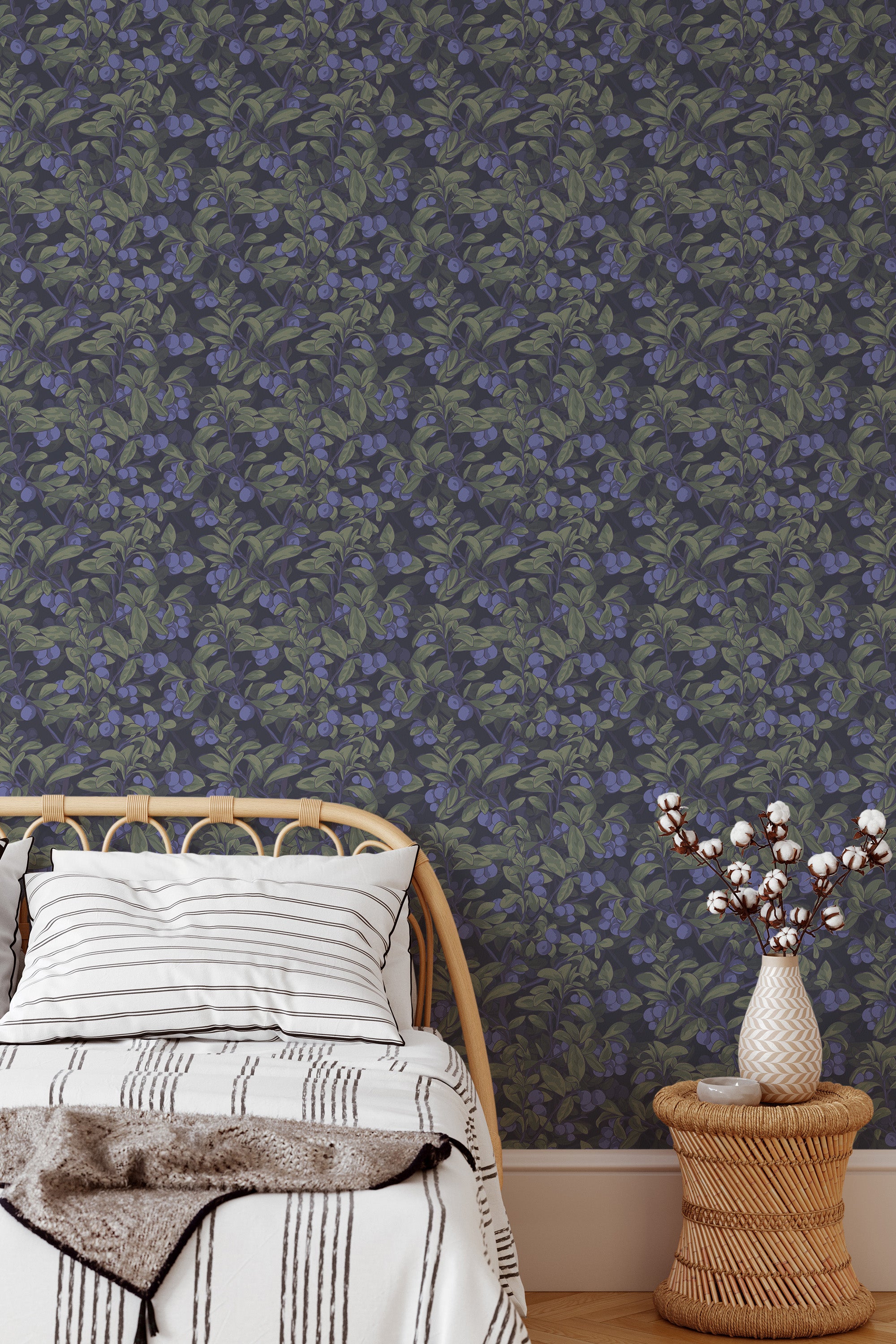 Self-adhesive wallpaper with a realistic blueberry pattern. Blueberries and green leaves are scattered across a dark background, creating a rich and textured nature-inspired aesthetic for the room.