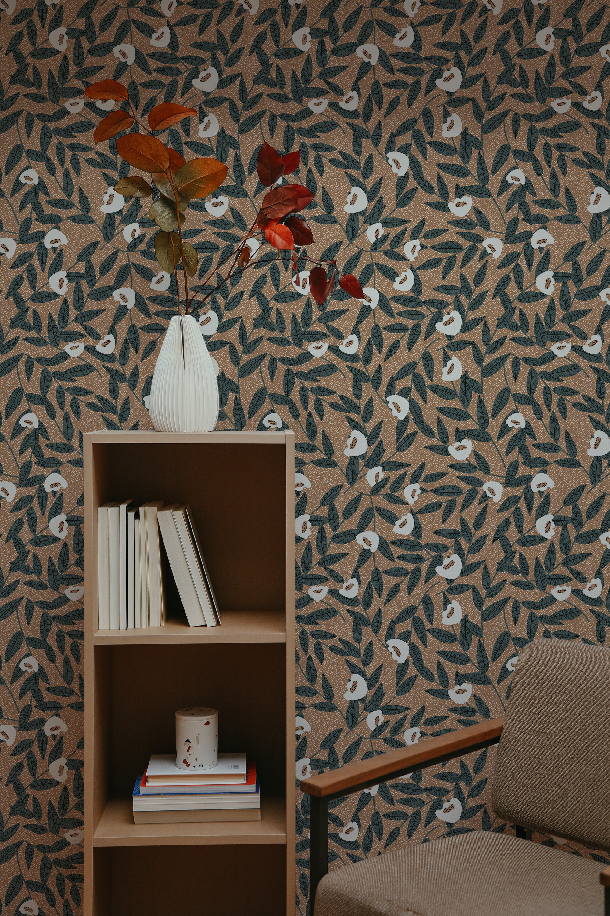 Self-adhesive wallpaper with a Brown eclectic leaf design, featuring dark green leaves and small white flowers on a warm brown background, adding a touch of nature-inspired elegance to the room.