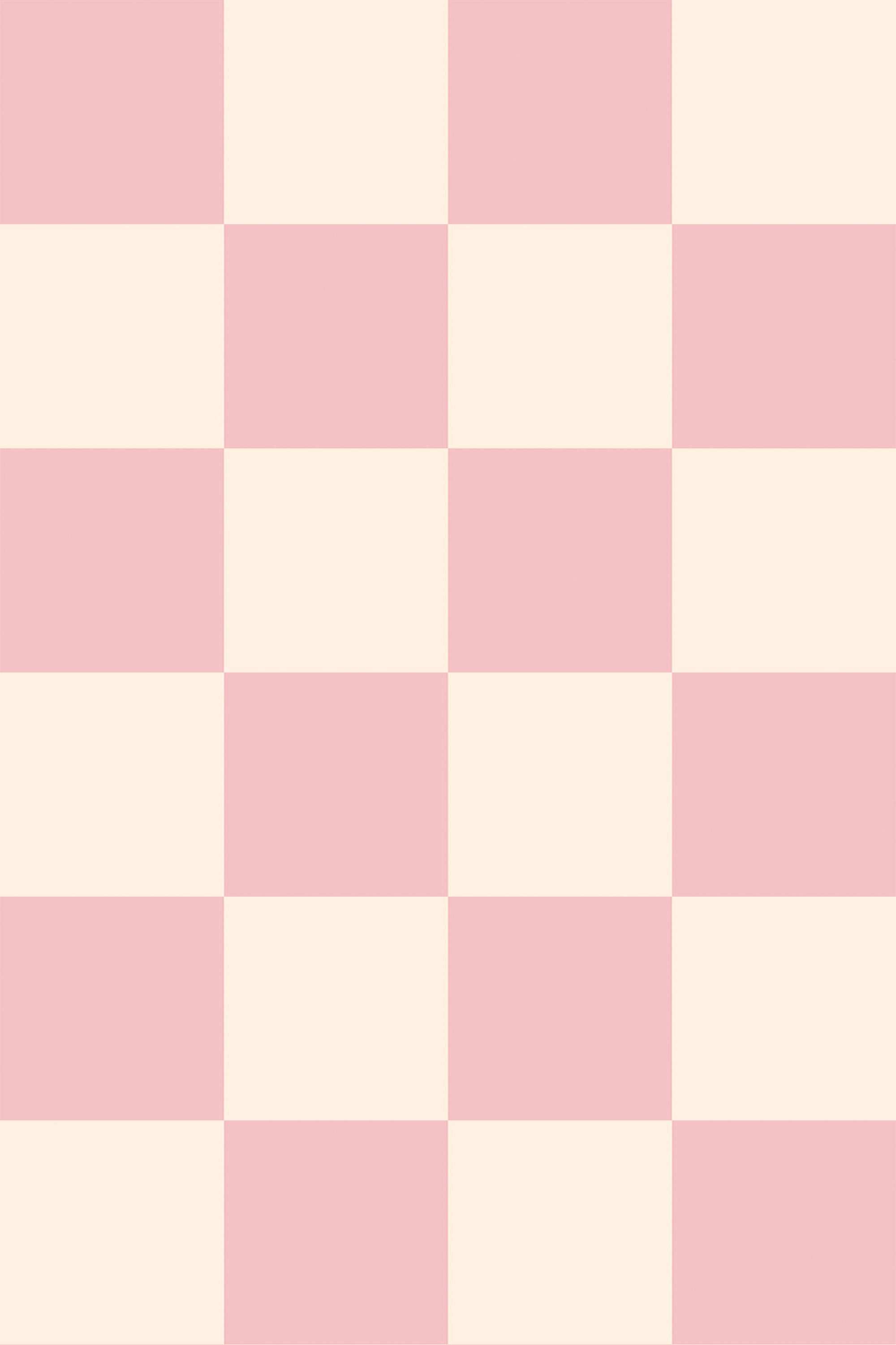 Pink and cream checkerboard pattern with alternating squares in a light pink and pale cream color. Peel and stick removable wallpaper.