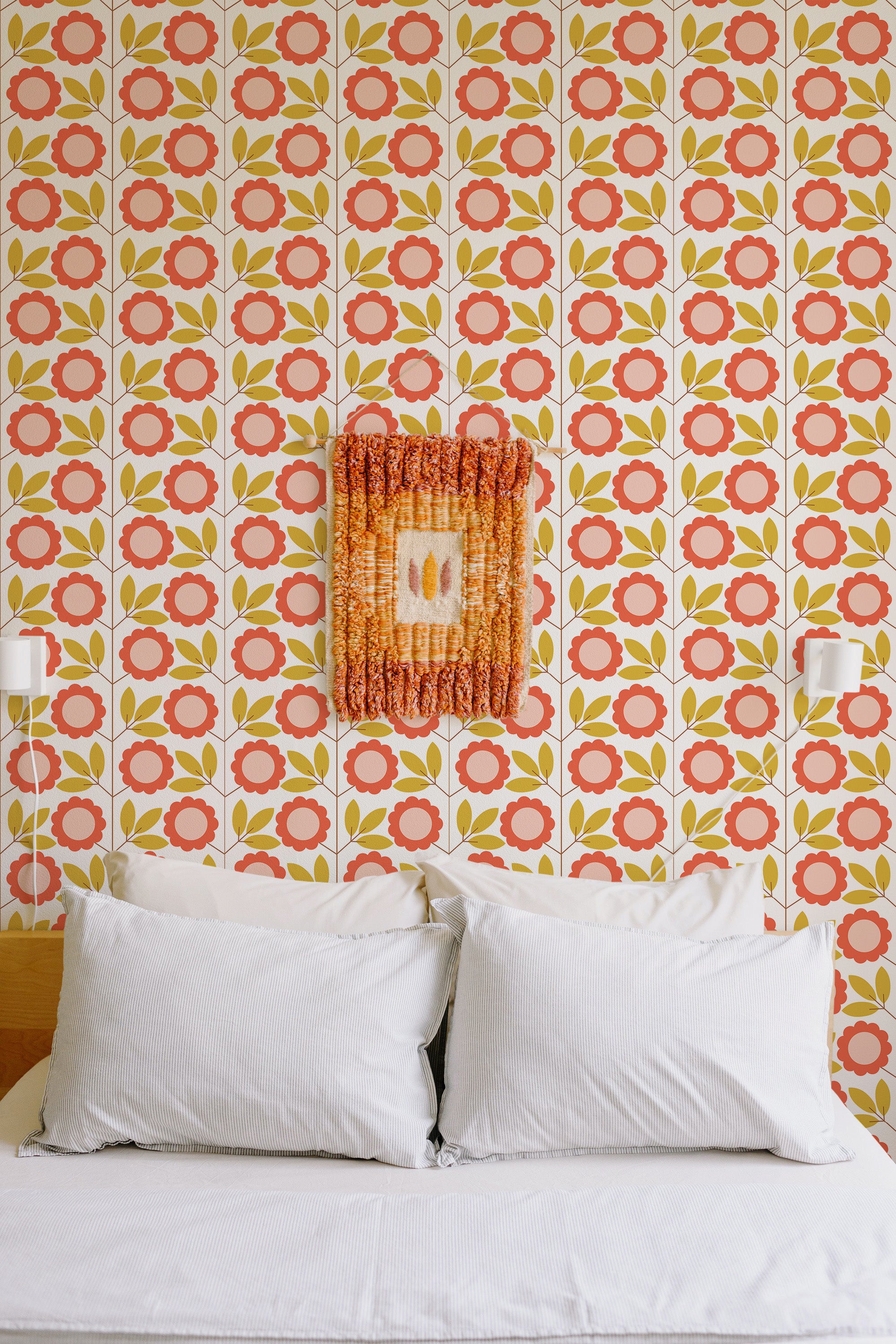 Self-adhesive wallpaper with an eclectic floral design, combining red circular flowers, yellow accents, and green leaves in a repeating pattern, creating a vibrant and retro look on the wall.