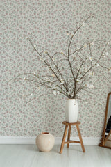 Self-adhesive wallpaper with a delicate Scandinavian rose pattern, where small, soft pink roses and green leaves create a subtle, elegant floral design on a neutral background.