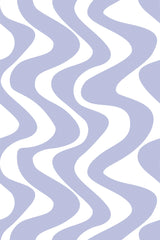 Wavy lines in soft lavender alternate with white curves, creating a flowing, beach-inspired pattern. Peel and stick removable wallpaper.