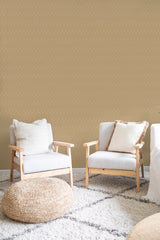 Retro wave-patterned wallpaper in vibrant yellow tones with repeating curved lines and soft geometric shapes, giving a mid-century modern feel to the room, complemented by light-colored furniture and natural textures. Traditional wallpaper.