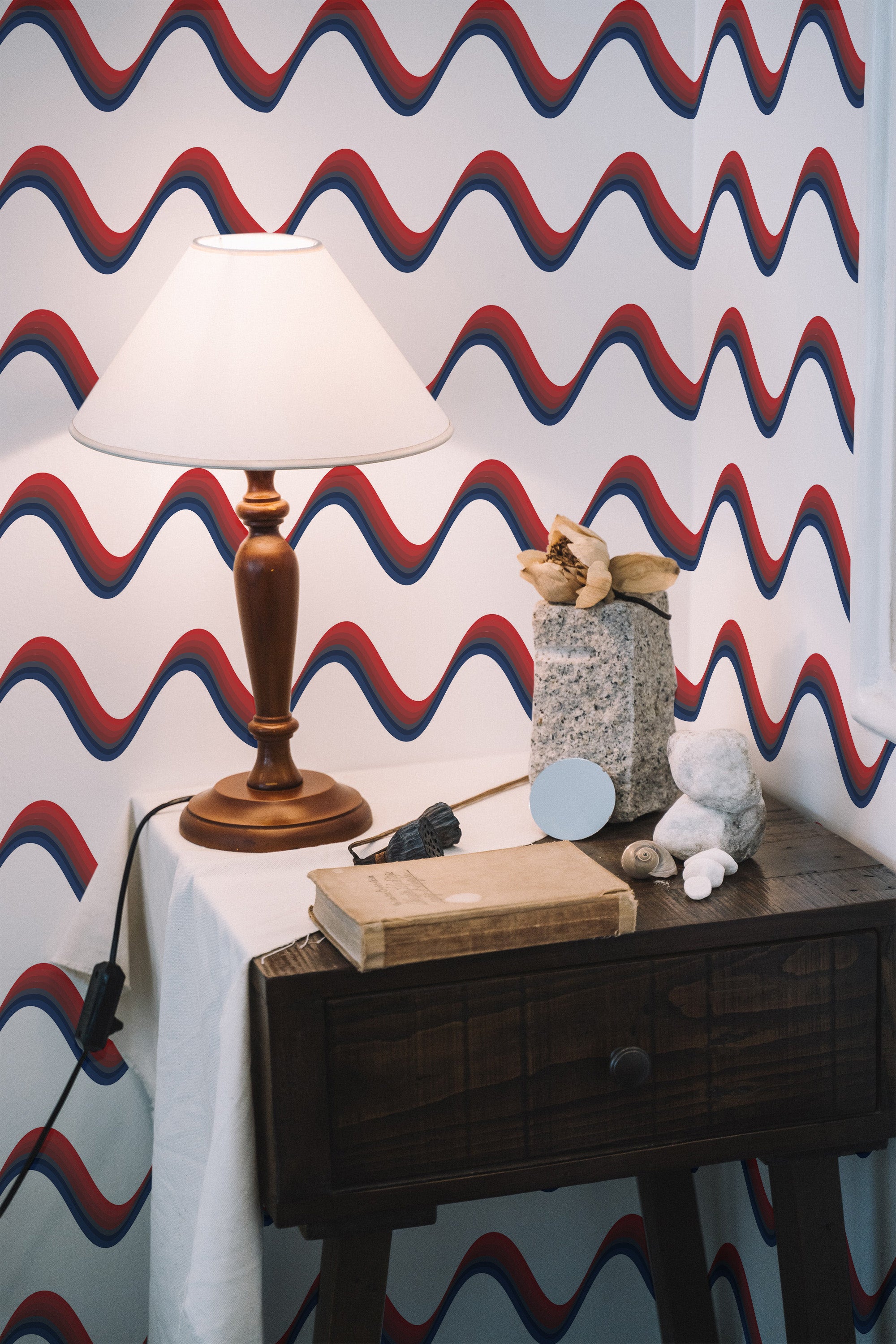 Self-adhesive wallpaper with a USA wave design, showing red, white, and blue wavy lines repeating horizontally across the wall for a patriotic effect.
