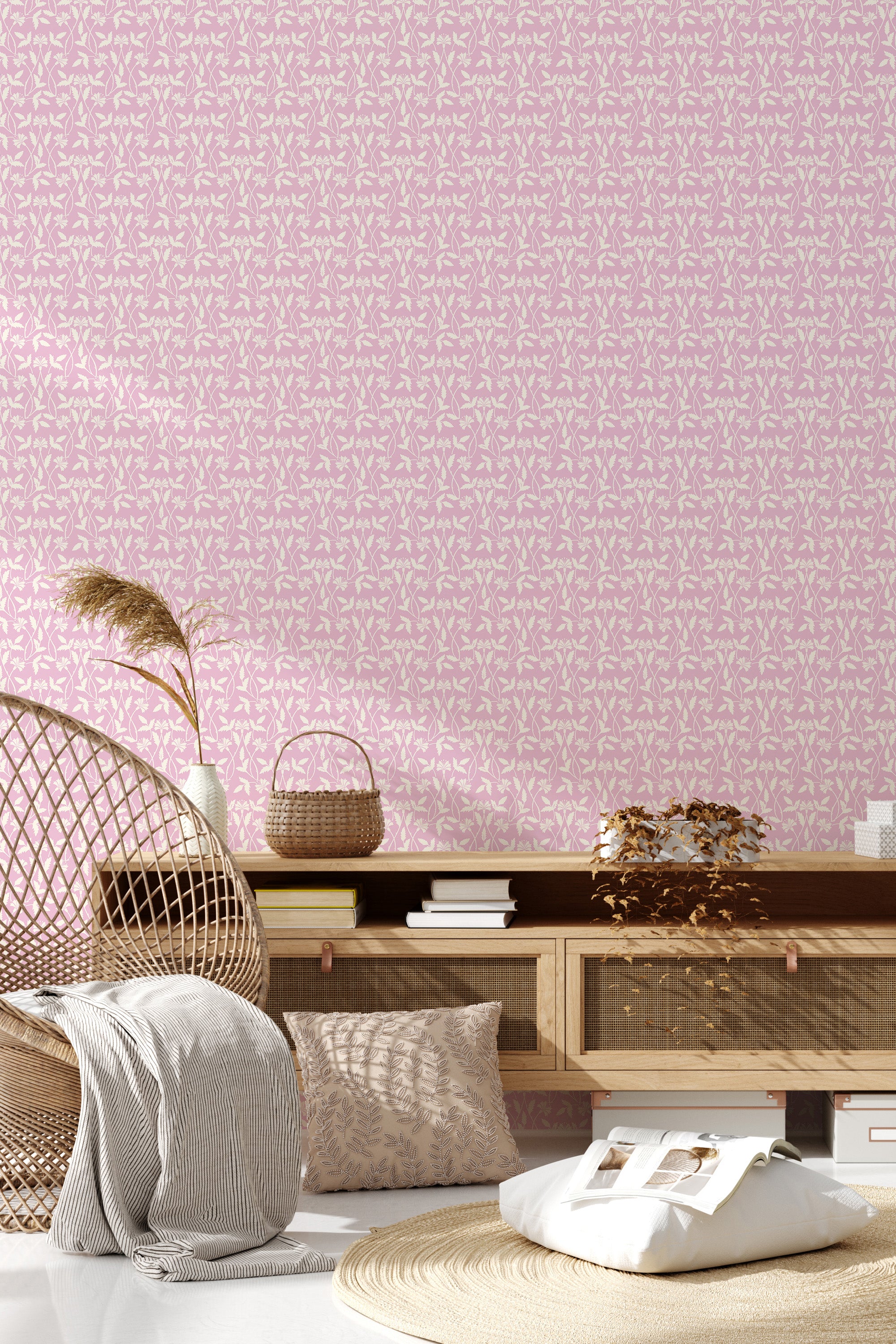 A room with light pink wallpaper patterned with delicate white vines and small blossoms, giving the space a soft and elegant feel. Traditional wallpaper.