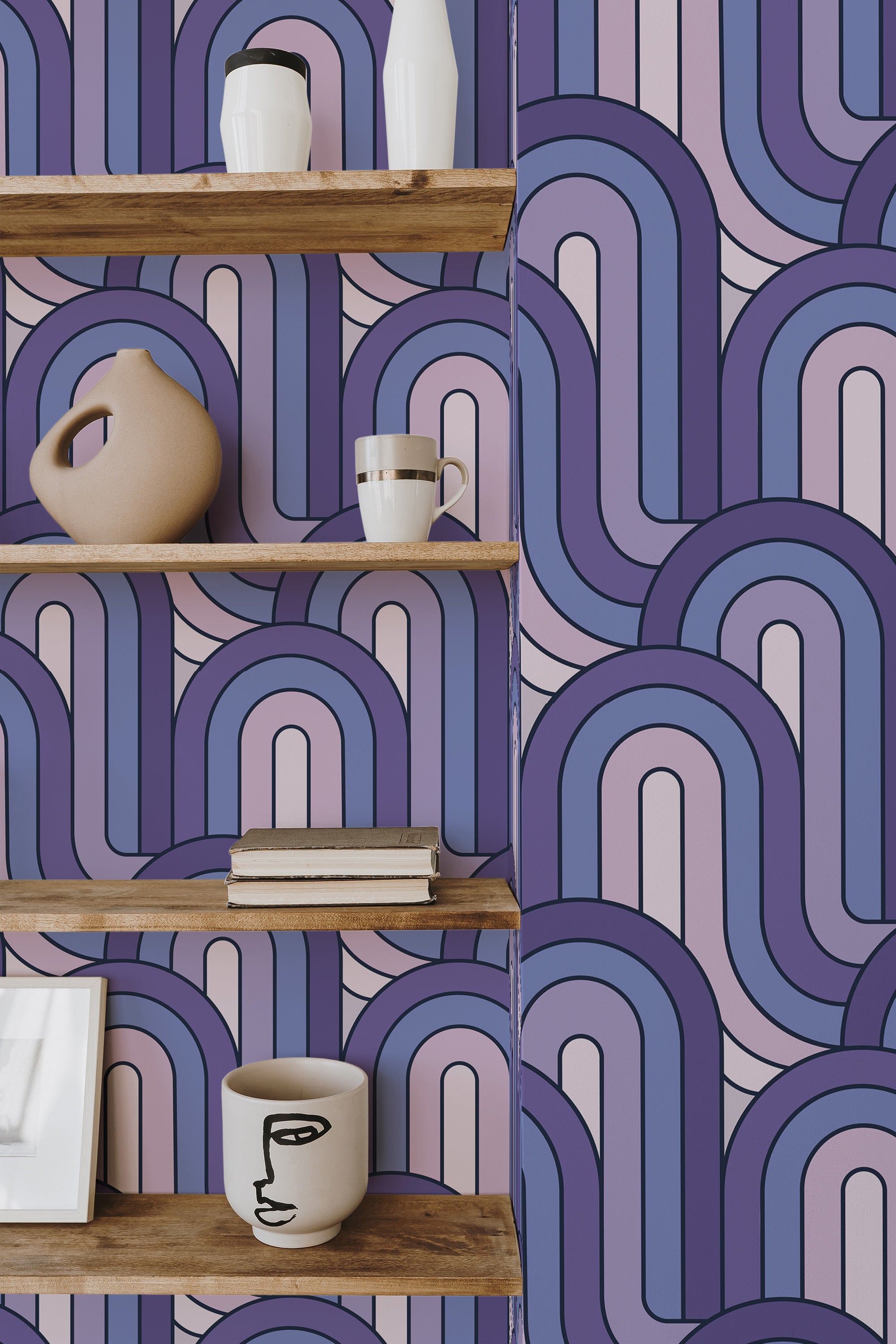 Self-adhesive wallpaper with a Purple retro design, mixing shades of purple, blue, and pink in an abstract, curving, layered pattern that adds a lively and modern feel to the room.