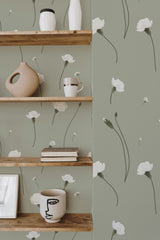 Self-adhesive wallpaper with a soft green background adorned with delicate white carnation flowers and slender stems, creating a serene and elegant atmosphere.