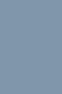 Solid dusty blue colored wallpaper with a smooth, matte finish, ideal for a minimalist or modern interior look, peel and stick removable wallpaper.