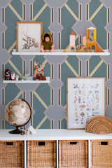Self-adhesive wallpaper with purple and blue geometric pattern in a room with decorative shelves and toys.