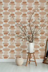 Self-adhesive boho dot stacks wallpaper with overlapping circles in shades of brown and beige on a neutral background, complementing a modern room decor style.