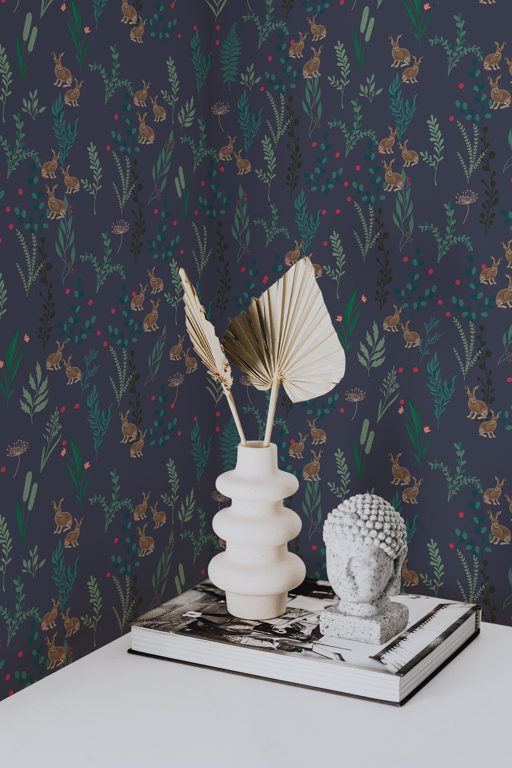Self-adhesive dark blue forest-themed wallpaper with deer, rabbits, and floral patterns in a room.