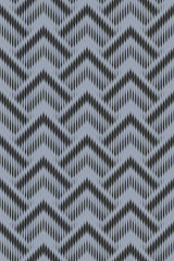 Blue and black abstract chevron pattern with alternating zigzag and dotted lines on a peel and stick removable wallpaper.