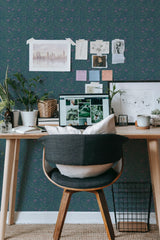 Self-adhesive dark retro floral wallpaper with a variety of intricate botanical patterns on an office wall, complementing a stylish workspace setup.