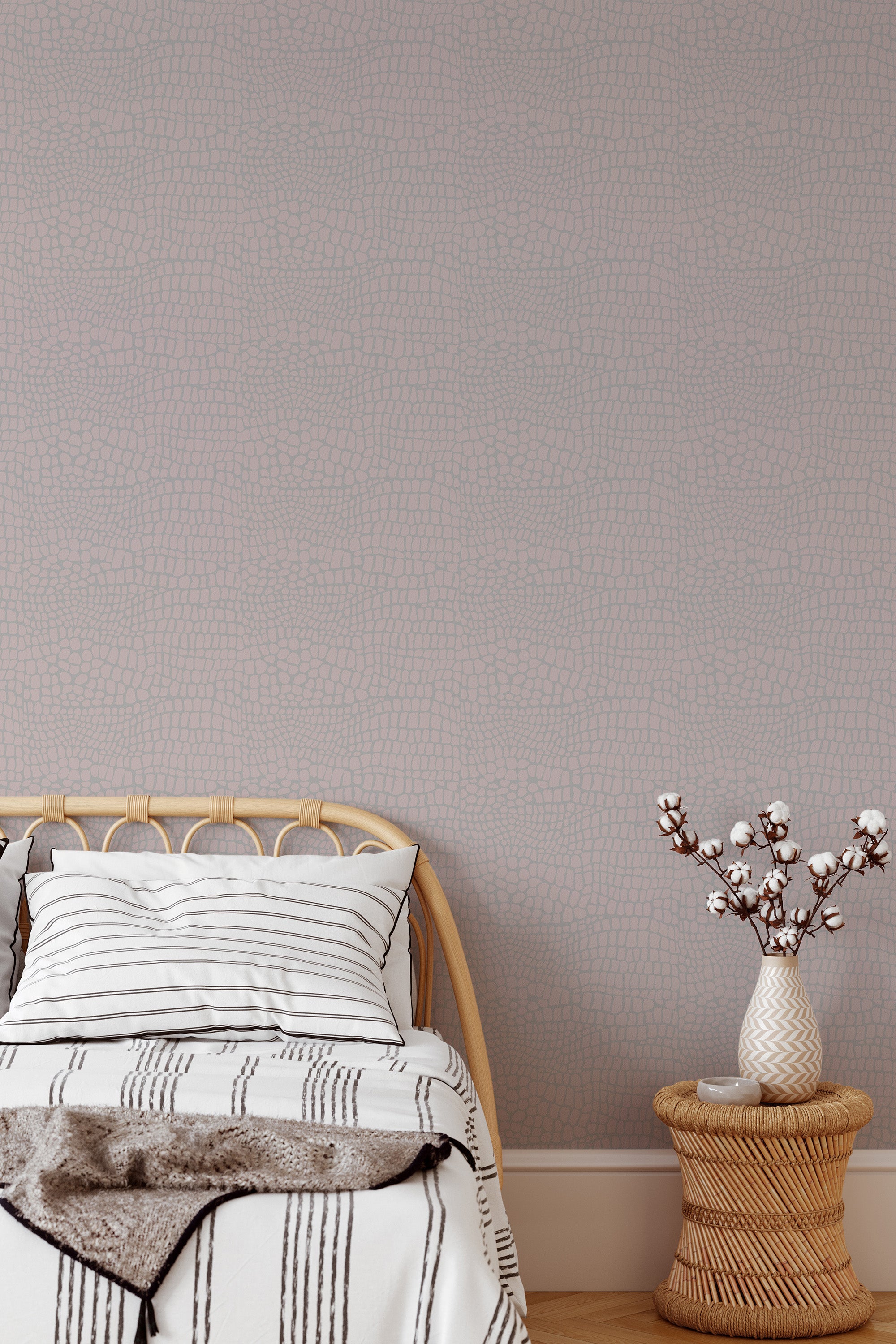 Self-adhesive Snakeskin-patterned wallpaper in a muted tone, accenting a modern bedroom with a stylish wicker vase and cozy bedding.