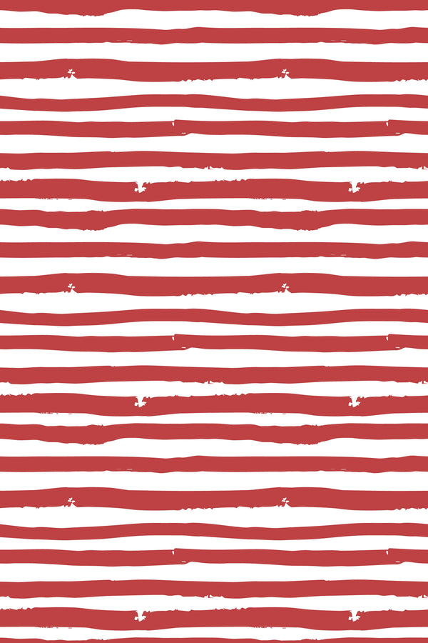 Red and white striped wallpaper with irregular hand-painted horizontal lines and a distressed finish