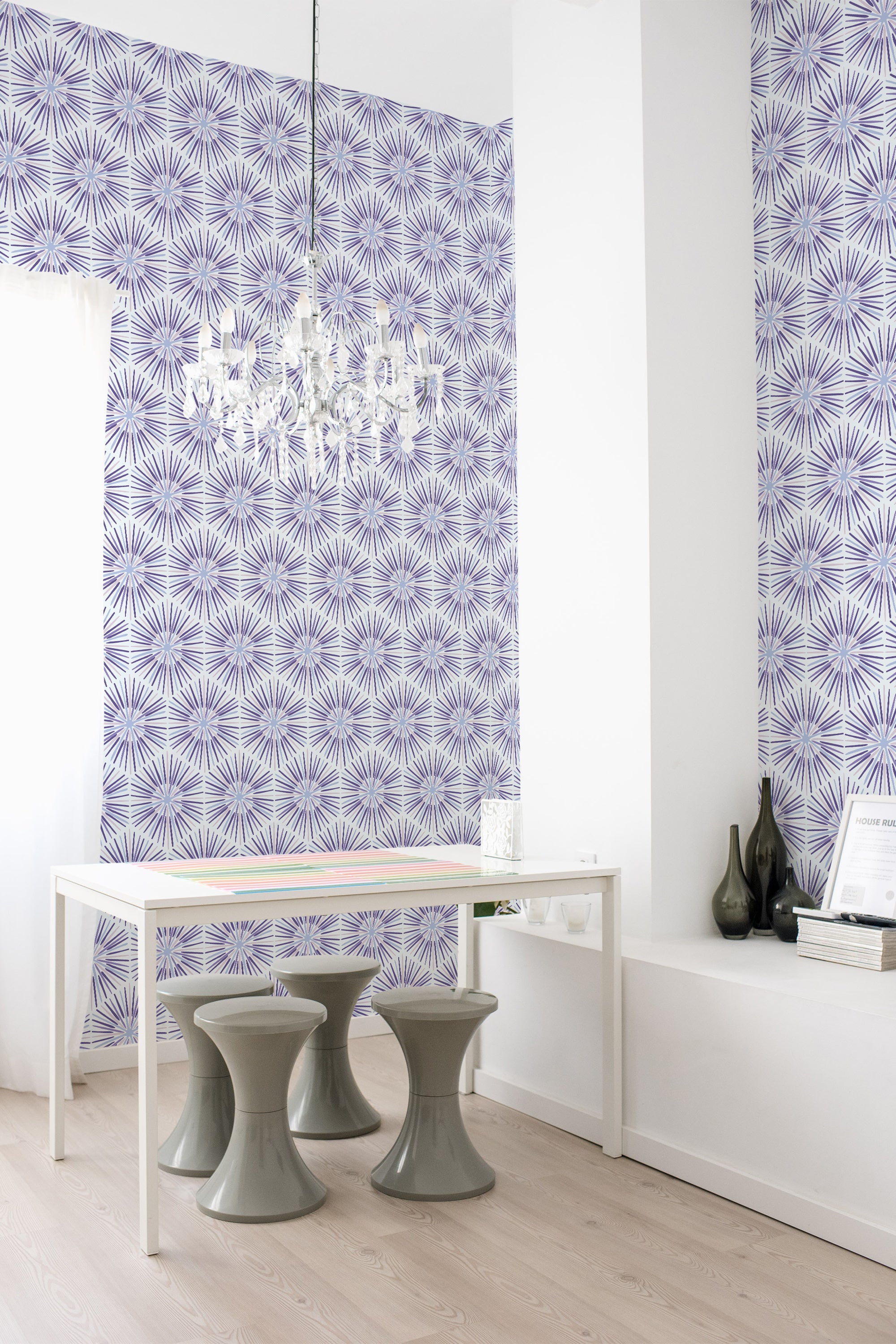 Wallpaper with a design of intricate purple star-shaped patterns arranged in a repeated tile format, adding a textured and vibrant aesthetic to the room. Traditional wallpaper.