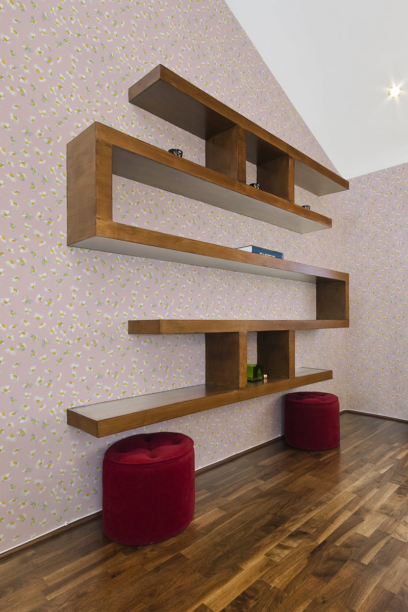 A room with 'Flying Daisies' design wallpaper, showing small, multicolored daisy patterns scattered across a light background, paired with modern wooden shelves and red stools, exemplifying traditional wallpaper.