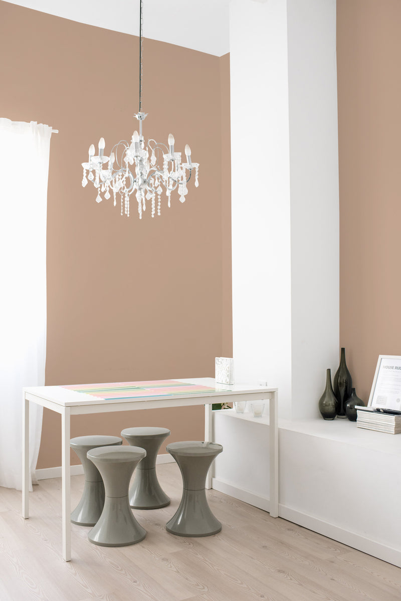 A warm, neutral-toned Solid Tan wallpaper in a muted beige shade, creating a calm and classic atmosphere in the room. The smooth, even color adds subtle sophistication while complementing various decor styles. Traditional wallpaper.