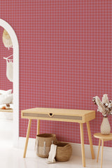 A room with Red Houndstooth-patterned wallpaper in a striking red and light pink color combination, providing a classic and bold geometric design. Traditional wallpaper.