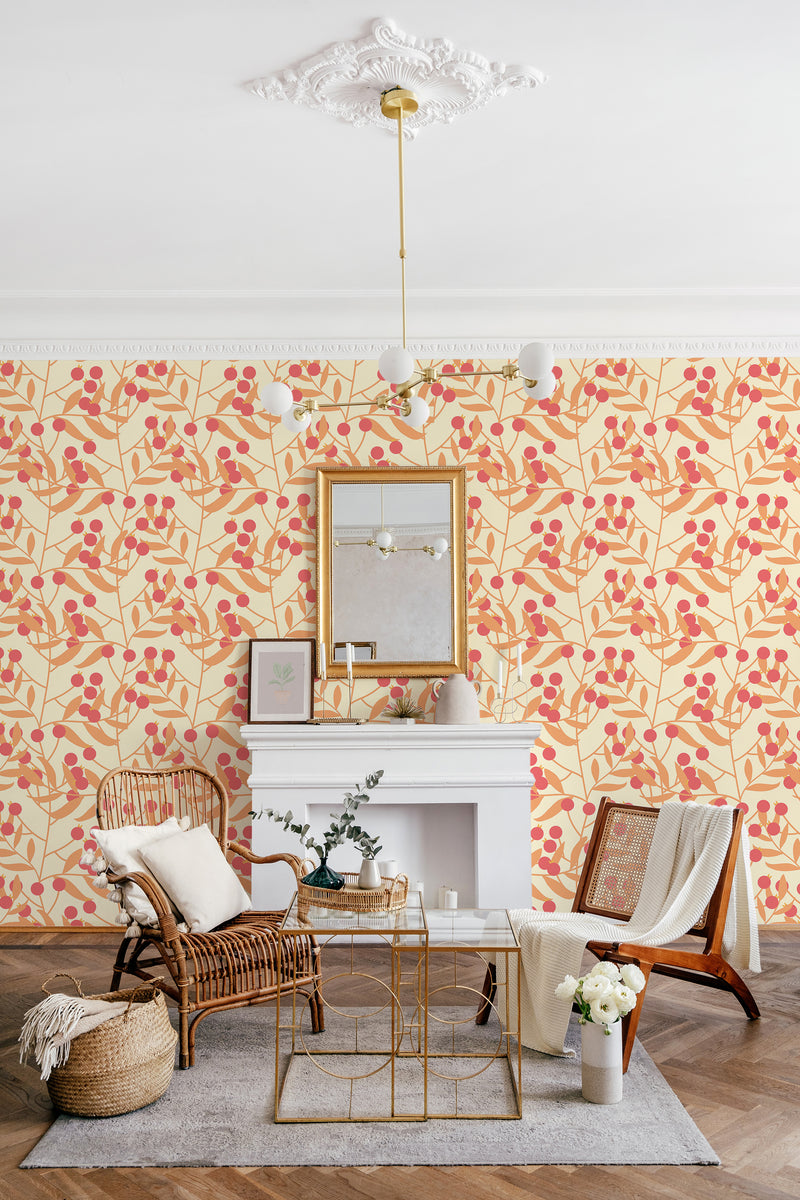 A room with wallpaper showing a pattern of red berries and green leaves on a light background, reminiscent of an autumn berry bush, traditional wallpaper.