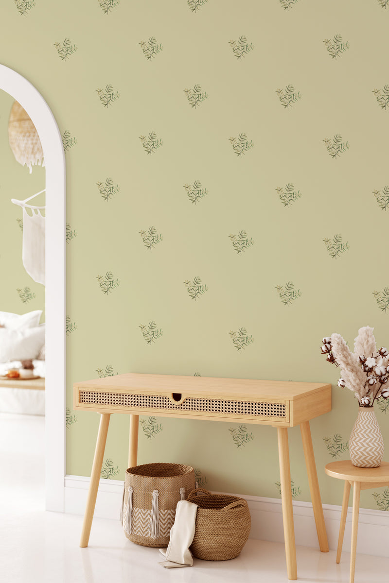 A pale green wallpaper with a pattern of delicate olive branches in a light contrasting color, giving a Mediterranean feel to the room's ambiance as a traditional wallpaper.