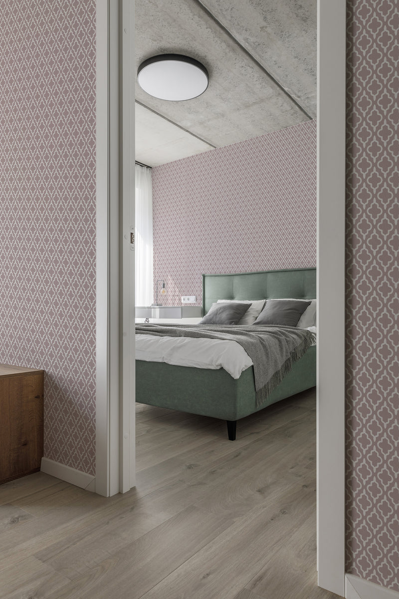 Bedroom with a graphic ornament wallpaper design in pink and white, creating a repetitive geometric pattern, offering a soft yet modern ambiance to the space, traditional wallpaper.