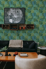 modern sophisticated living room leather sofa green and teal leaves peel and stick removable wallpaper