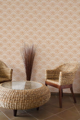 Self-adhesive Vintage Terracotta Art Deco wallpaper with an intricate geometric pattern, providing a retro backdrop in a room with wicker furniture.