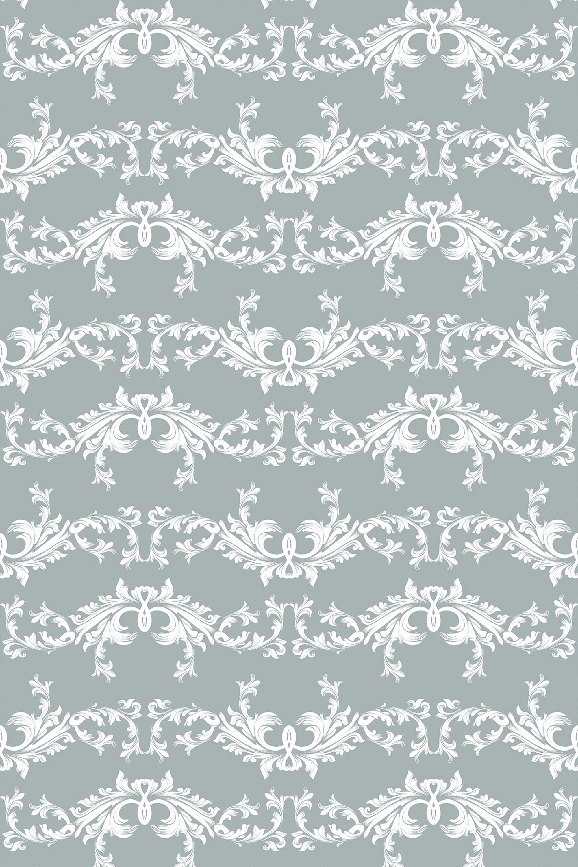 A seamless pattern of white elegant damask designs on a soft gray background, forming a classic and sophisticated aesthetic for peel and stick removable wallpaper.