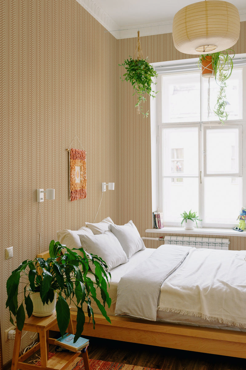 stick and peel wallpaper tan herringbone pattern bedroom boho wall decor green plants
