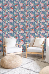 cozy living room soft armchairs pillows tropical bird wall decor