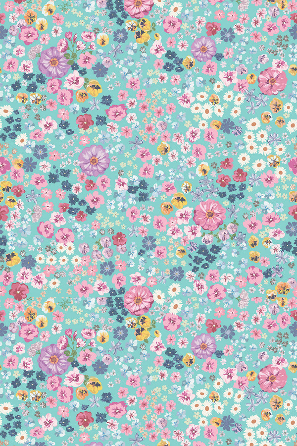 A variety of small and large colorful flowers scattered across a soft blue background on peel and stick removable wallpaper.