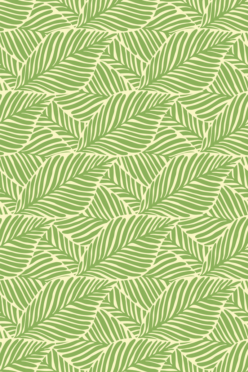 Pattern of overlapping green leaves on a light background, creating a vintage botanical look for a peel and stick removable wallpaper.