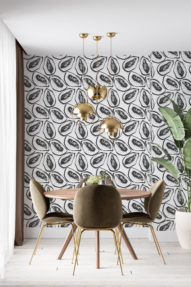 A room with wallpaper patterned with a black and white fruit design, resembling papaya slices, complementing the brass light fixtures and modern furniture, traditional wallpaper.