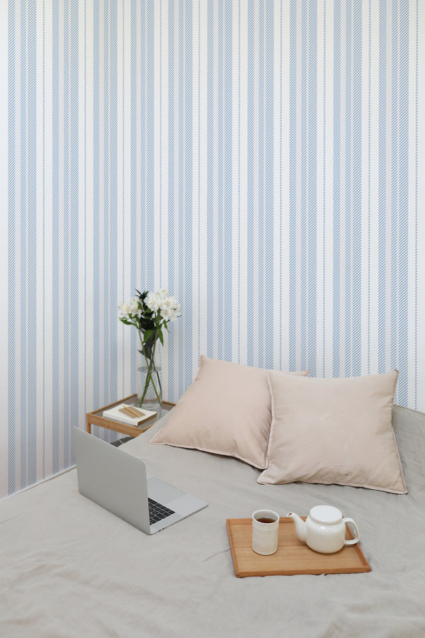 temporary wallpaper blue stripes pattern cozy romantic bedroom interior