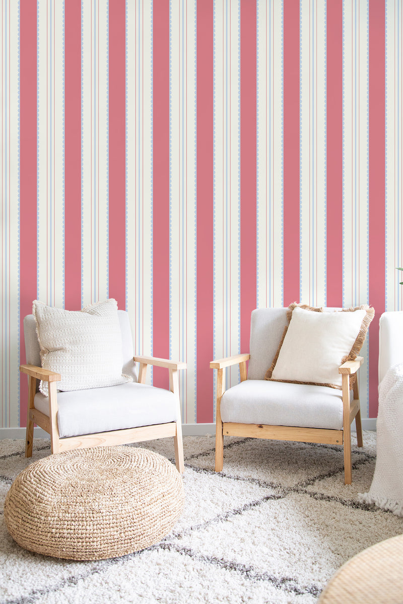 cozy living room soft armchairs pillows pink and beige cute french stripes wall decor