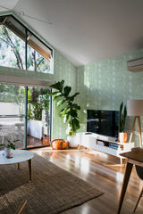 minimalist house terrace green plants living room large dumbo sage green stick and peel wallpaper