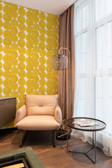 wallpaper stick and peel large dumbo yellow pattern modern armchair lamp table reading area