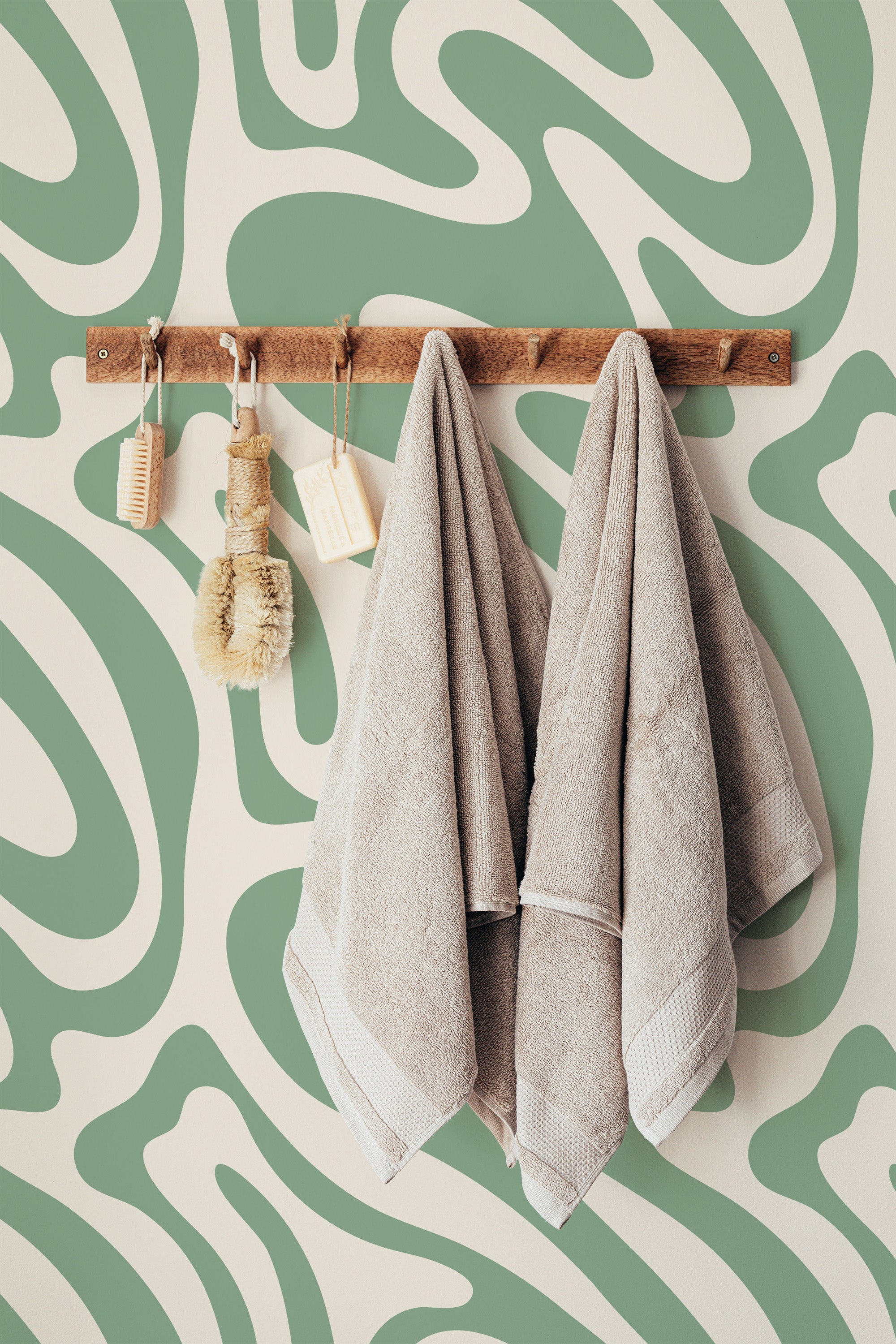 stick and peel wallpaper funky green an beige pattern bathroom brush soap towel accessory wall