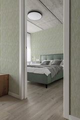 modern bedroom cushions concrete ceiling subtle gray and green accent wall