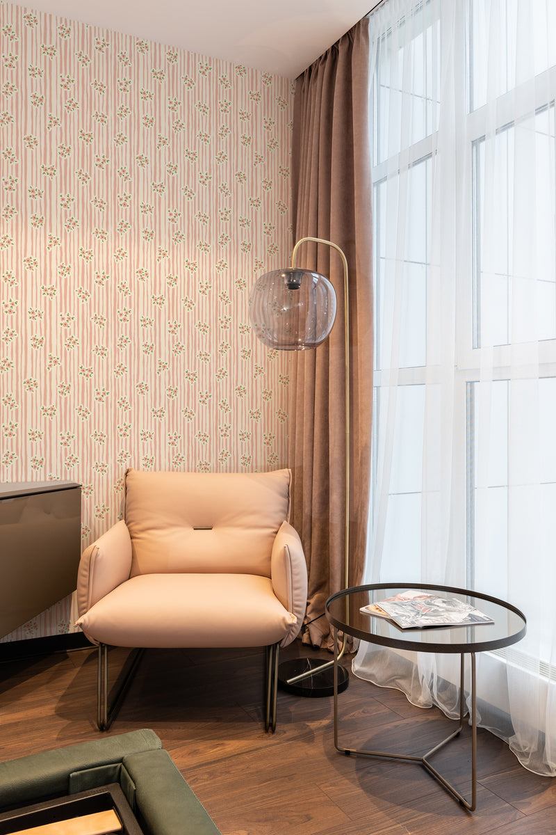 wallpaper stick and peel cottage flowers pattern modern armchair lamp table reading area