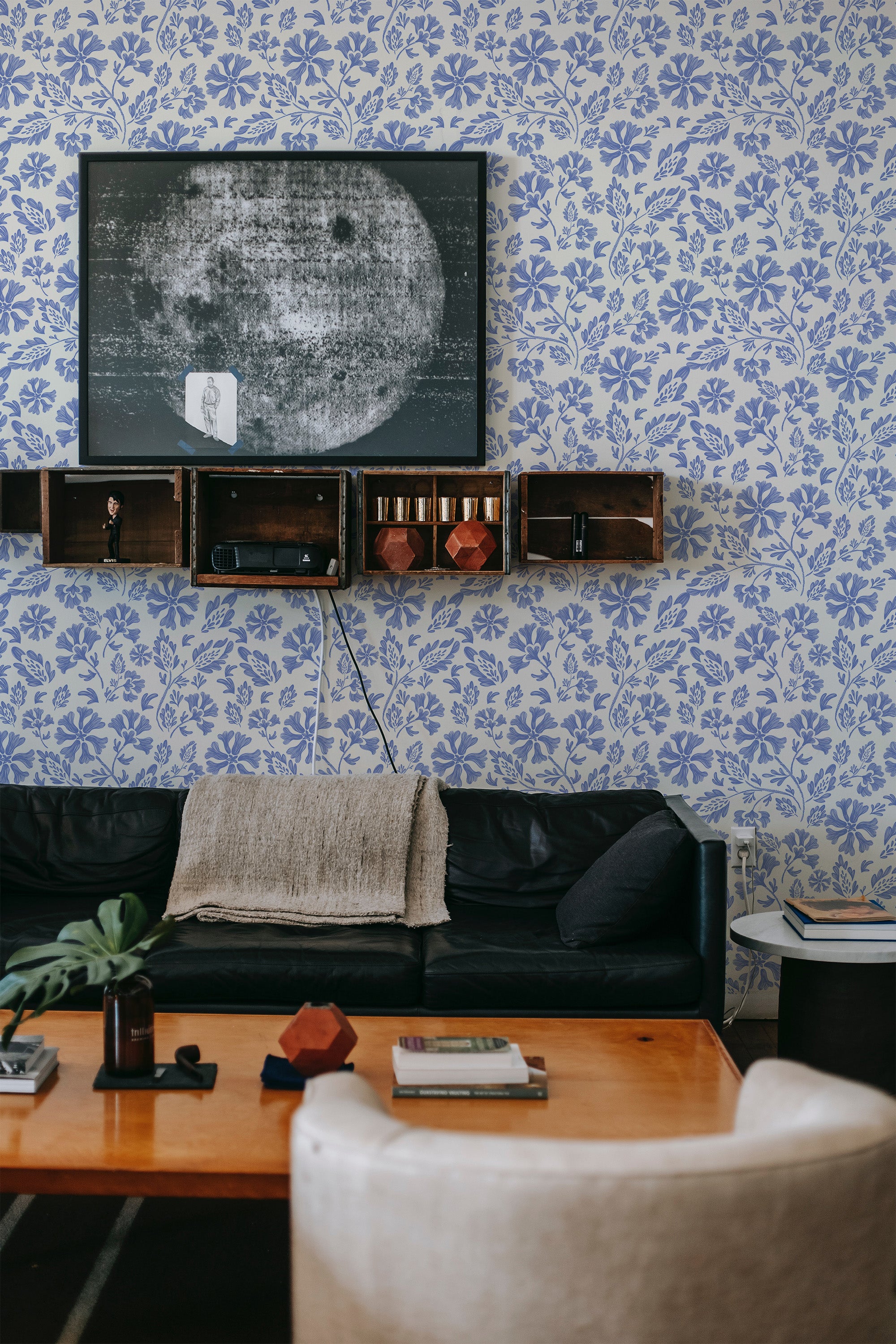 modern sophisticated living room leather sofa blue and beige floral peel and stick removable wallpaper