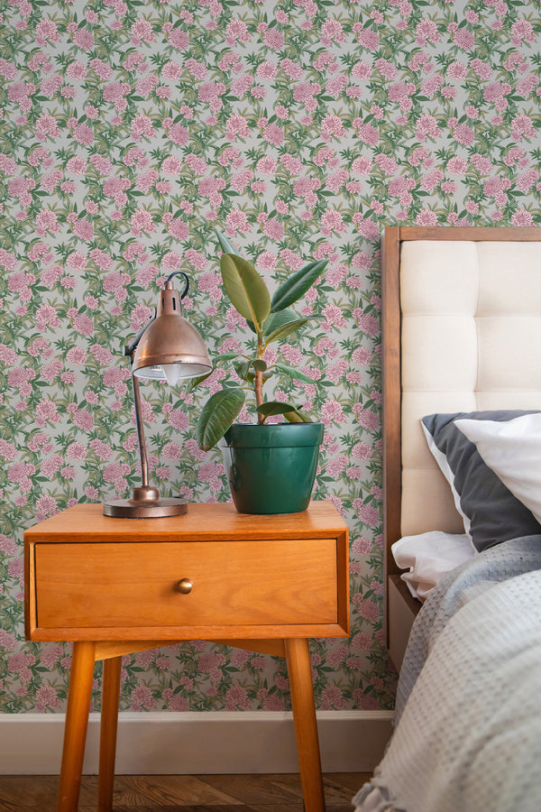 stylish bedroom interior nightstand plant lamp pink dahlias accent wall